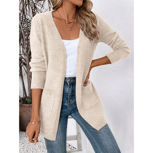 Woman wearing the Liora open-front pocket cardigan in Apricot