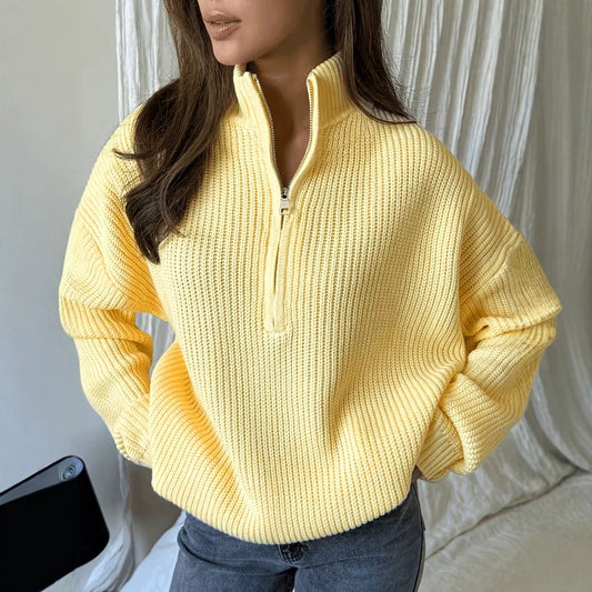 Woman wearing the Vela ribbed half-zip sweater in Yellow
